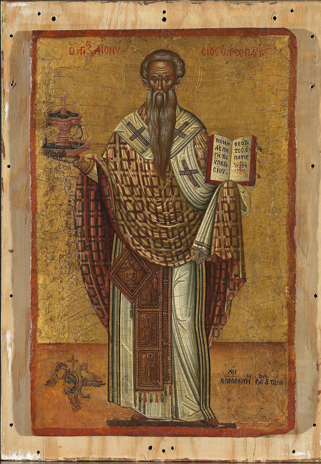 Cretan-school icon of Dionysius the Areopagite as a bishop, white-bearded, in a white omophorion marked with black crosses, holding an open book inscribed in Greek, a censer on a stand beside him, against a gold ground.