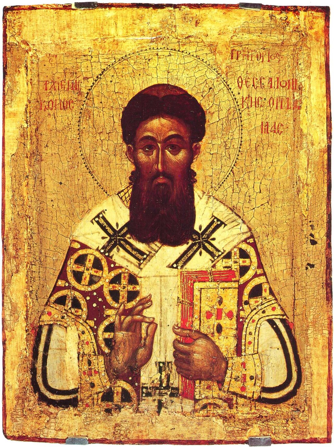 Icon of Gregory Palamas as archbishop, dark-haired and dark-bearded, right hand raised in blessing and a jewelled gospel book in his left, on a heavily crazed gold ground with his name in red Greek letters beside his halo.